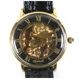 An Ingersoll skeleton gold plated gentleman's wristwatch, case 33mm, on a black strap. Notes: in