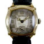 A rare Illinois gold plated gentleman's wristwatch, with fancy cushion case