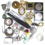 A small group of costume jewellery, including brooches, some silver and cameo, necklaces, a silver