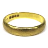 A 22ct gold wedding band ring, 3.8mm wide, size Q, 3.9g.