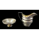 Two pieces of George III and later silver, comprising A George III milk jug with parcel gilt