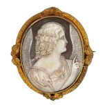 A Victorian oval cameo brooch, depicting an angel in profile, in a gold scrolling mount with leaf