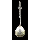 An early 20th century Danish spoon, with shell style decoration to its handle, initials and date 'E&