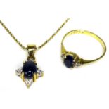 An 18ct gold, diamond and sapphire necklace and ring, formed of an oval sapphire cabochon surrounded