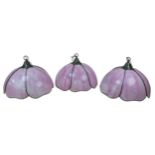 Three large modern Tiffany style ceiling light shades, each shade made up of six pink opaque glass