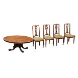 An Edwardian walnut oval topped breakfast table, raised upon cabriole legs and scroll feet, 135 by