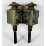 A pair of Victorian coach lamps, painted black with red inset circular glass to sides. (2)