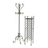 A cast metal wine rack with capacity for 30 bottles, 36 by 36 by 138.5cm high, a bronzed effect coat