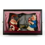 A vintage Punch and Judy diorama display case, 57 by 37 by 11cm.