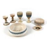 A group of Joba, Stamford, pottery, comprising two goblets, 14.5cm high, two candlesticks, 11.5cm