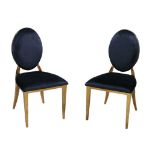 Two pairs of 21st century dining chairs, one pair with navy blue upholstered backs and seats and a