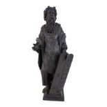 An 18th century carved wooden sculpture of Moses and the Ten Commandments, raised on square