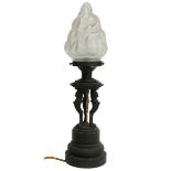 A French bronze table lamp, early 20th century, with flame shaped frosted glass shade, the body with