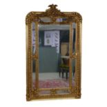A large 19th century style gilt framed mirror, 107 by 179.5cm high.