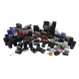 A large collection of cameras, lenses and accessories, including Kodak, Canon, Sirus and other