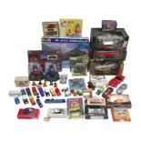 A group of model vehicles, including Maisto, Burago, Corgi, Matchbox, and Lledo, some boxed, two