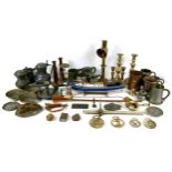 A mixed group of metal wares and collectables, including a brass ejector candlestick with angled