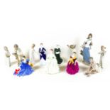 A collection of figurines, including three early Lladro bedtime figures, 'Girl in nightdress with