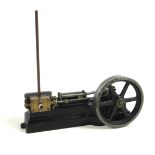 A Stuart miniature single-piston stationary engine, painted black, 22 by 9 by 22cm high. (1)