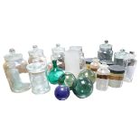 A collection of glass fishing floats and other items,