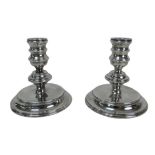 A collection of silver plate, including a pair of Mappin and Webb short candlesticks, 11.5cm high, a