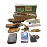 A collection of nine model boats, including a partially assembled Krick Victoria steam boat kit, a