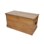 A pine blanket box, with metal handles and lift lid, 85.5 by 42 by 43.5cm high.