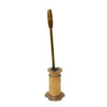 A brass poker stand, made from a shell case, stamped to base 'REF L1633 AB1', stand 15cm high,