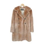 A vintage ladies fur coat, possibly fox, from Franklin for Furs of Leicester, with a Joseph Fox