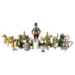 A collection of mixed metal wares, including brass figures of horses and two cavalry door stops,