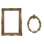 Two 20th century gilt wall mirrors, including a molded oval mirror, 66.5 by 51cm, and a large