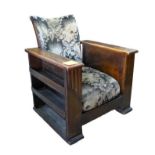 An Art Deco reclining library chair with integral bookshelves and drinks cabinet to the sides, in