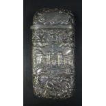A Victorian silver 'castle top' cigar case, by Nathaniel Mills, with repoussé embossed castle images