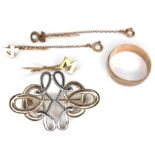 A group of 9ct gold jewellery, comprising a gold band, size P, a white and yellow gold brooch, 3.7