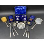 A group of silver and collectables, including a cased set of teaspoons, a coin inset dish, two