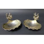 A pair of ERII royal commemorative silver gilt salt dishes, with ornate handles incorporating