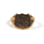 A 9ct yellow gold signet ring, the shield engraved with a monogram 'THS', size R, 3.8g.