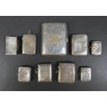 A collection of seven Victorian and later silver vesta cases, including a Victorian vesta case
