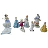 A collection of Royal Worcester and Royal Doulton figurines, comprising Royal Worcester limited