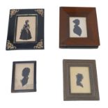 Four silhouette portraits of 18th and 19th century ladies, including a reverse glass full length