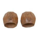 A pair of Robert Mouseman Thompson carved oak napkin rings, both with the carved mouse signature,
