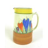 A Clarice Cliff 'Autumn Crocus' tankard water jug, gold stamp to the base, 18.5cm high.