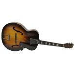 A 1960s Harmony Master archtop semi-acoustic guitar in tobacco sunburst, serial no. 2068H945, with
