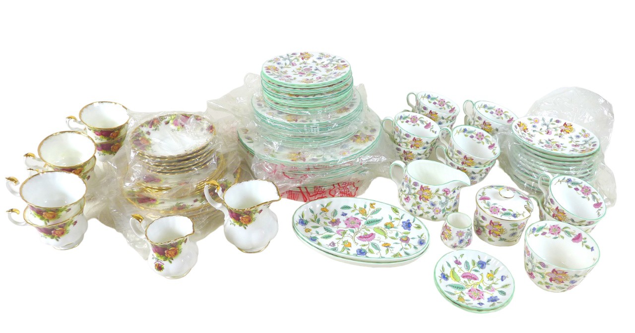 A Minton part dinner and tea service, decorated in the 'Haddon Hall' pattern, including cups,