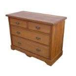 An Edwardian walnut chest of two over two drawers, 110 by 50.5 by 80.5cm high.