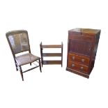 A group of furniture, comprising an Edwardian mahogany washstand, 50.5 by 39.5 by 86.5cm high, a