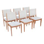 A set of six Danish teak chairs believed to be Johannes Andersson, with upholstered backs and seats.
