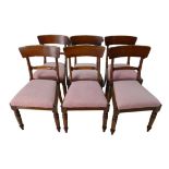 Six Victorian mahogany dining chairs, with solid, curved top rail and carved central rail, drop in