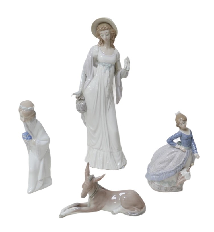 Four Lladro figurines, comprising a 'Dainty Lady', 35cm high, 'Evita' girl with umbrella, 18cm high,