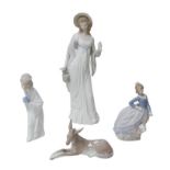 Four Lladro figurines, comprising a 'Dainty Lady', 35cm high, 'Evita' girl with umbrella, 18cm high,
